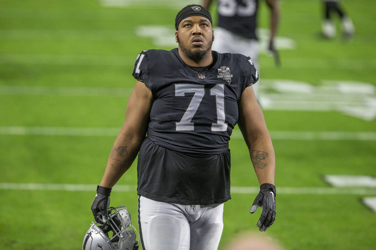 Raiders offensive guard Denzelle Good (71) warms up before an NFL football game against the Mia ...