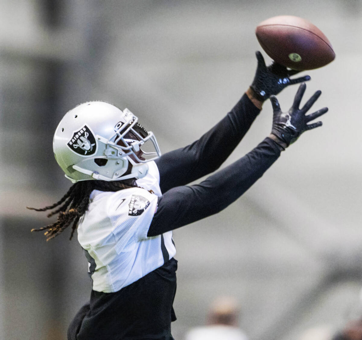 Raiders wide receiver Davante Adams (17) makes a catch during the team’s training camp p ...