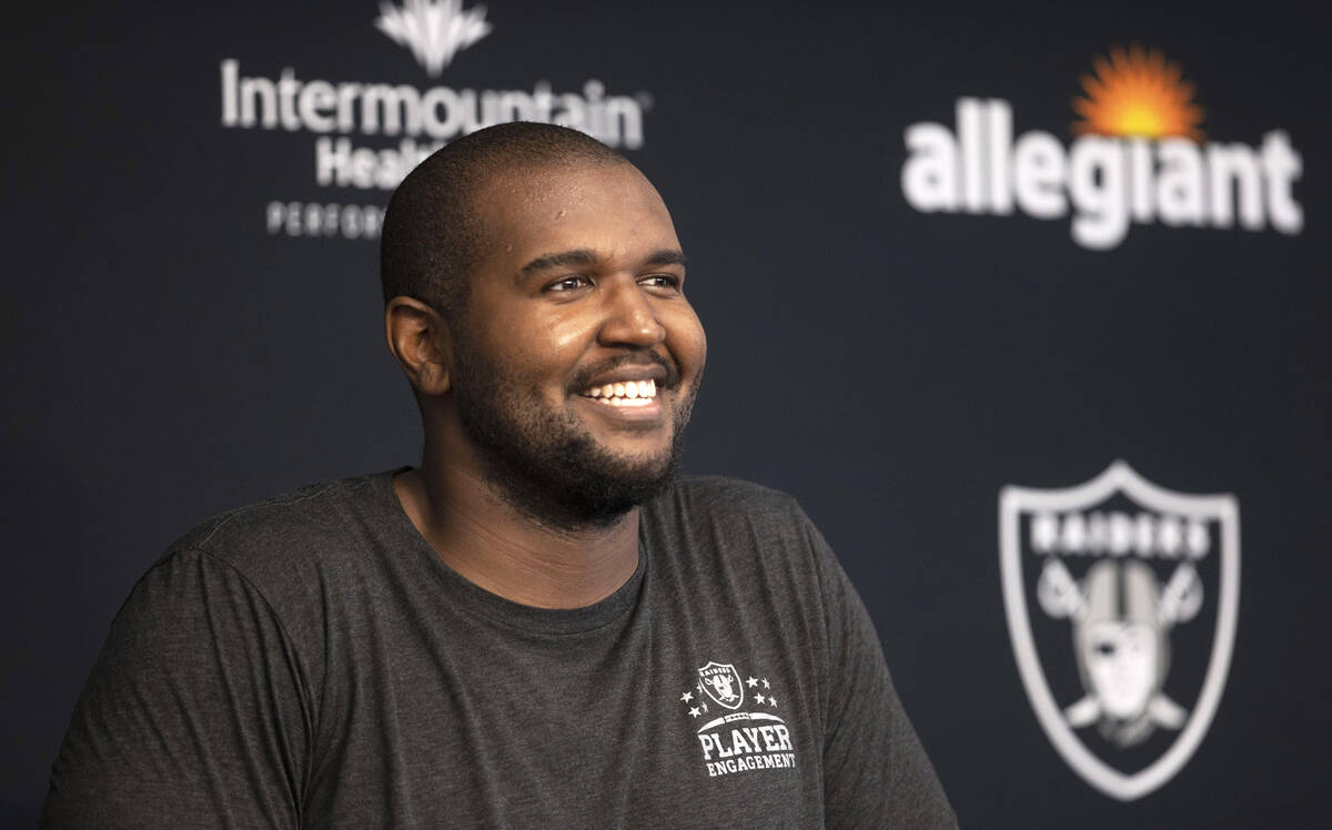 Raiders offensive tackle Brandon Parker smiles during a news conference following the team&#x20 ...