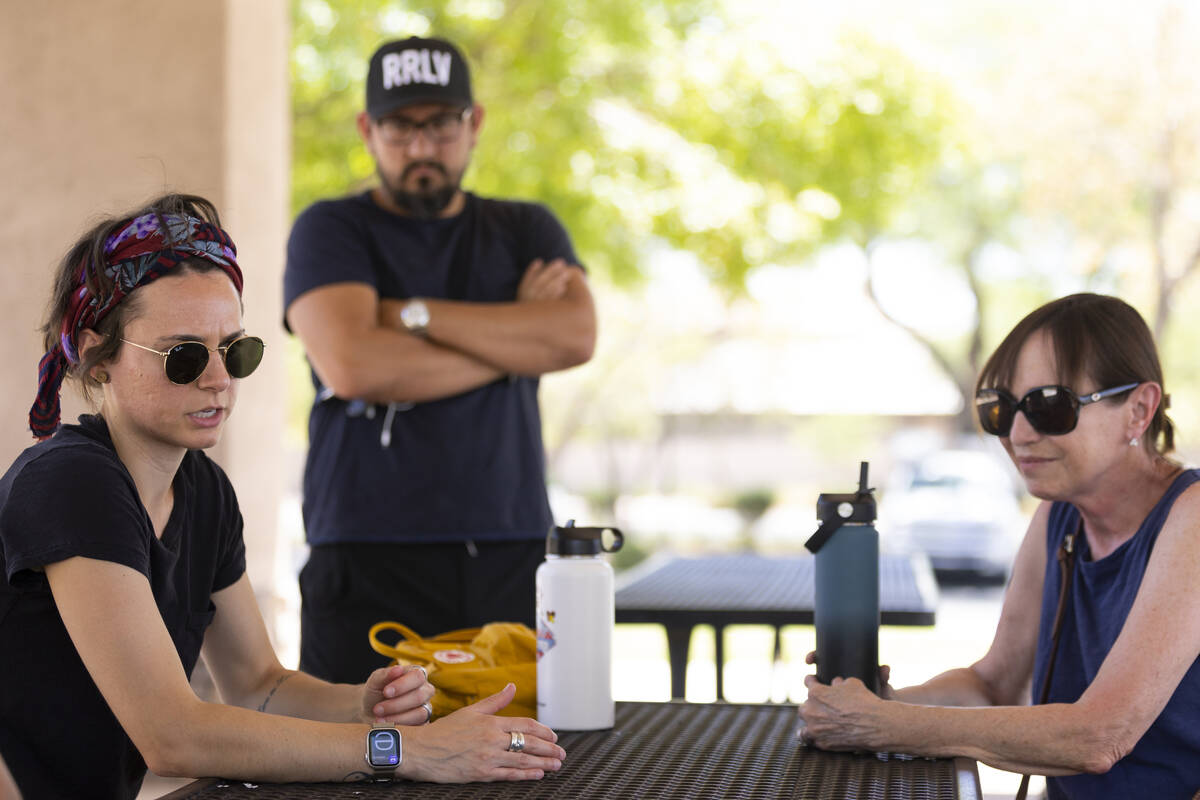 Danielle Eiferman, from left, with Pablo Gatti, and Wendy Johnston, shares her concerns on the ...