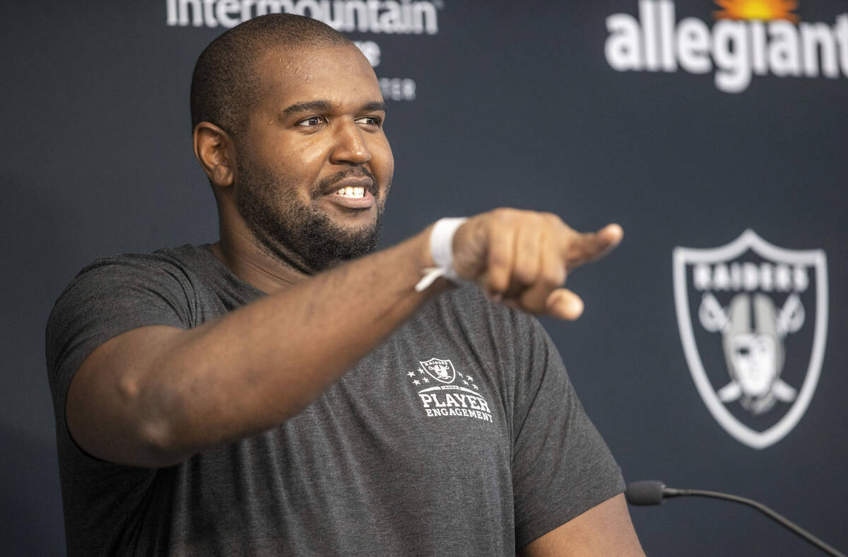 Raiders offensive tackle Brandon Parker (75) reacts to a question during a news conference at t ...