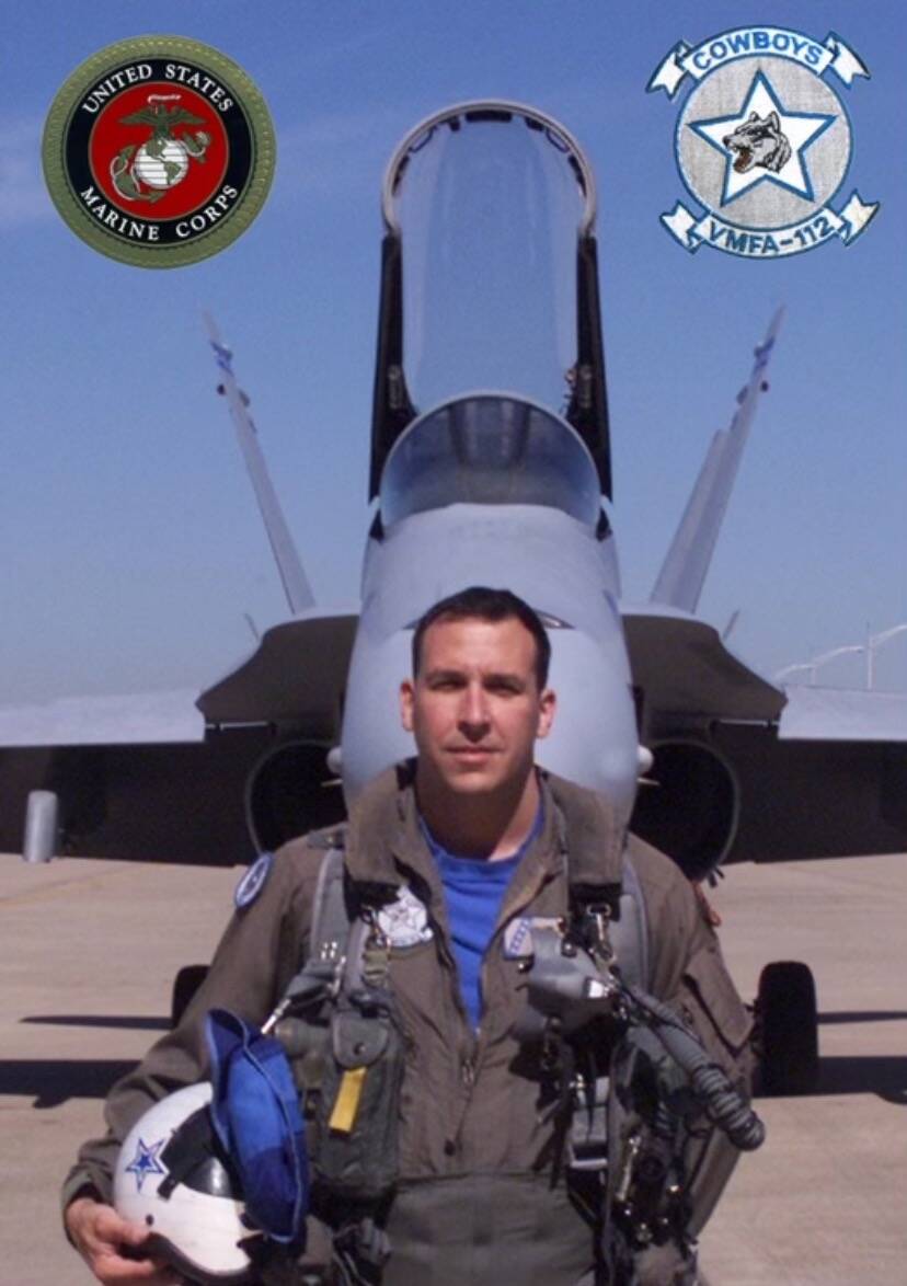Marines Corp Lt. Col Ross Scanio poses in front of a fighter jet. Scanio, 58, died in a single- ...
