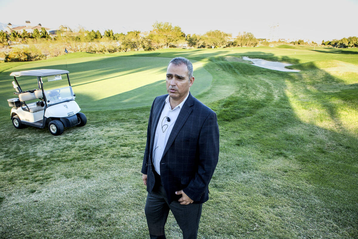 Yohan Lowie, CEO & founder of EHB Cos., views the landscape at Badlands golf course on Oct. 9, ...