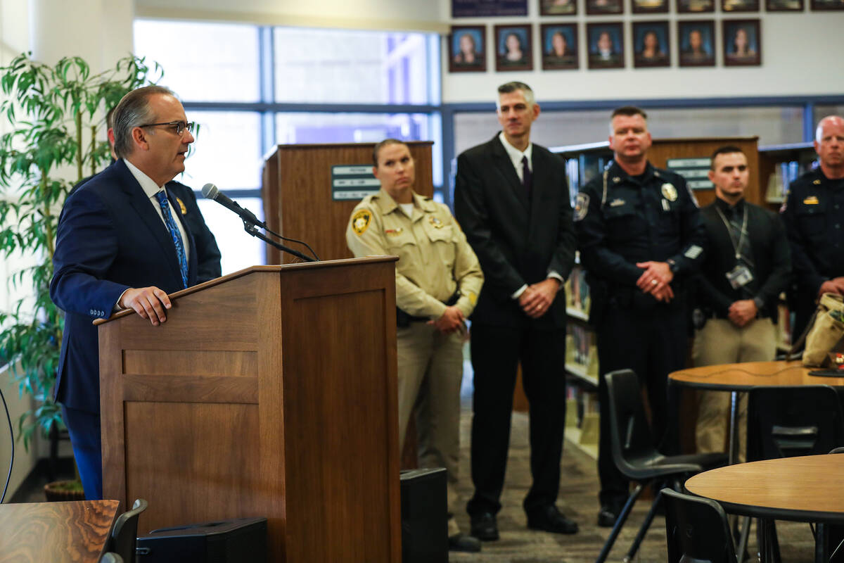 Superintendent Jesus Jara speaks next to Metropolitan Police Department and Clark County School ...