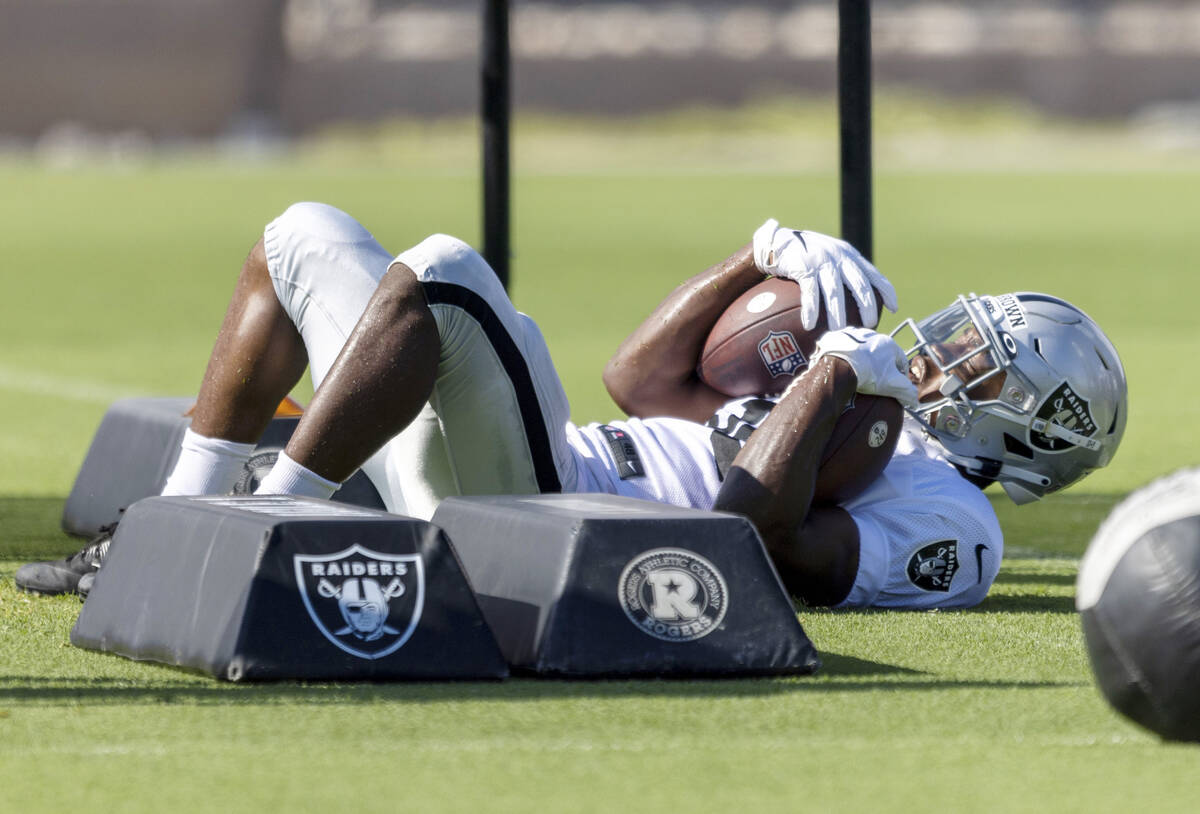 Raiders running back Brittain Brown (38) executes a drill during the team’s training cam ...