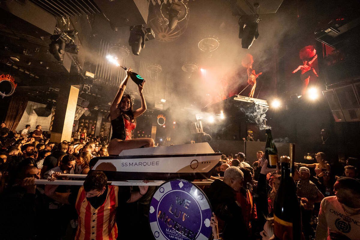 Bottle service is served upon a prop boat at Marquee Nightclub in The Cosmopolitan of Las Vegas ...