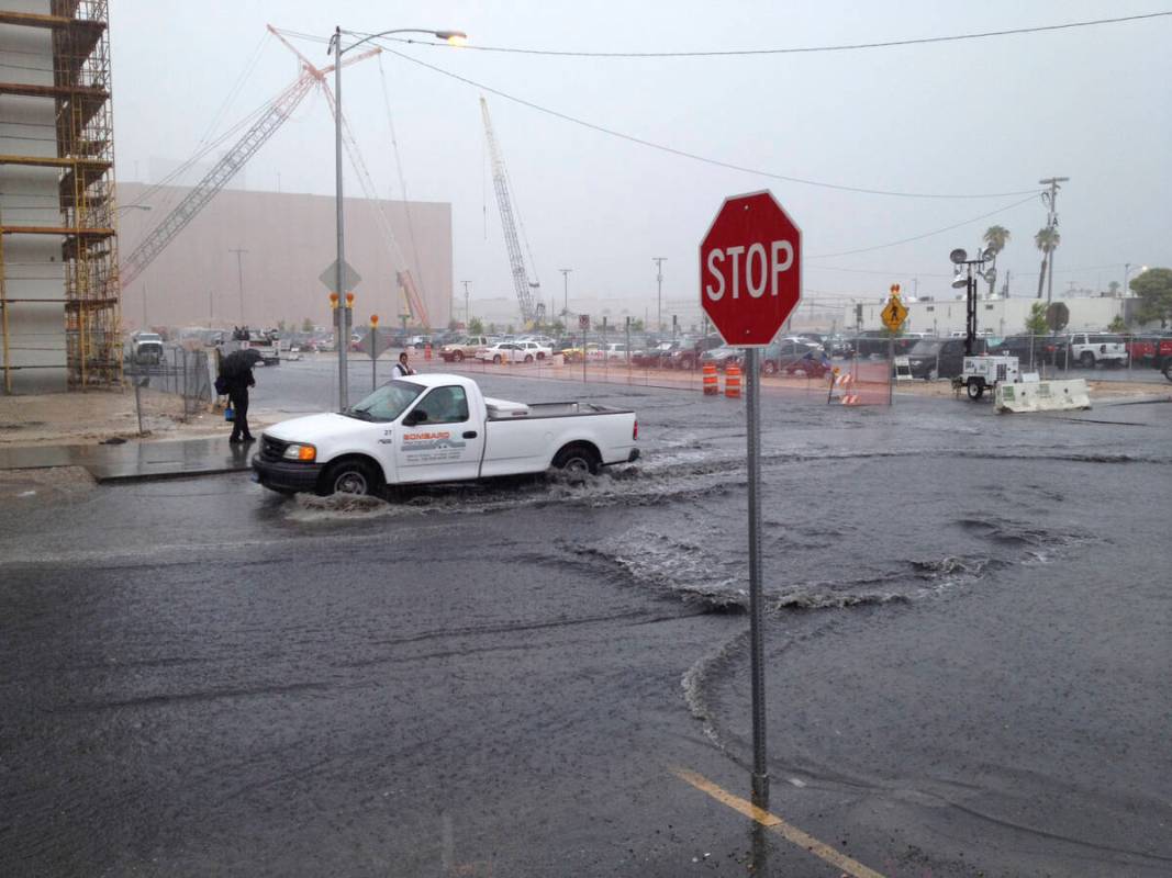 Flooding is seen behind The Flamingo hotel-casino on the Las Vegas Strip on Sept. 11, 2012. (Jo ...