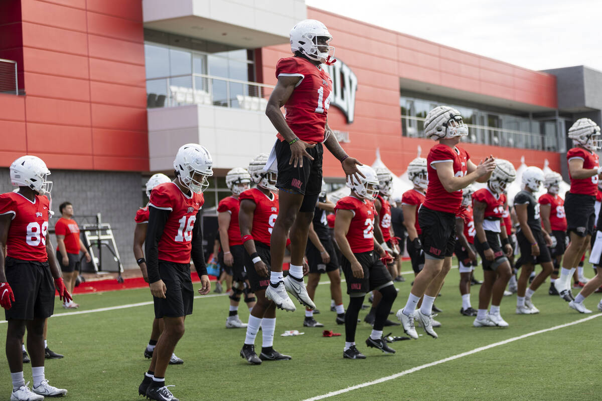 UNLV's Zyell Griffin (14) warms up during a team football practice at UNLV in Las Vegas, Saturd ...