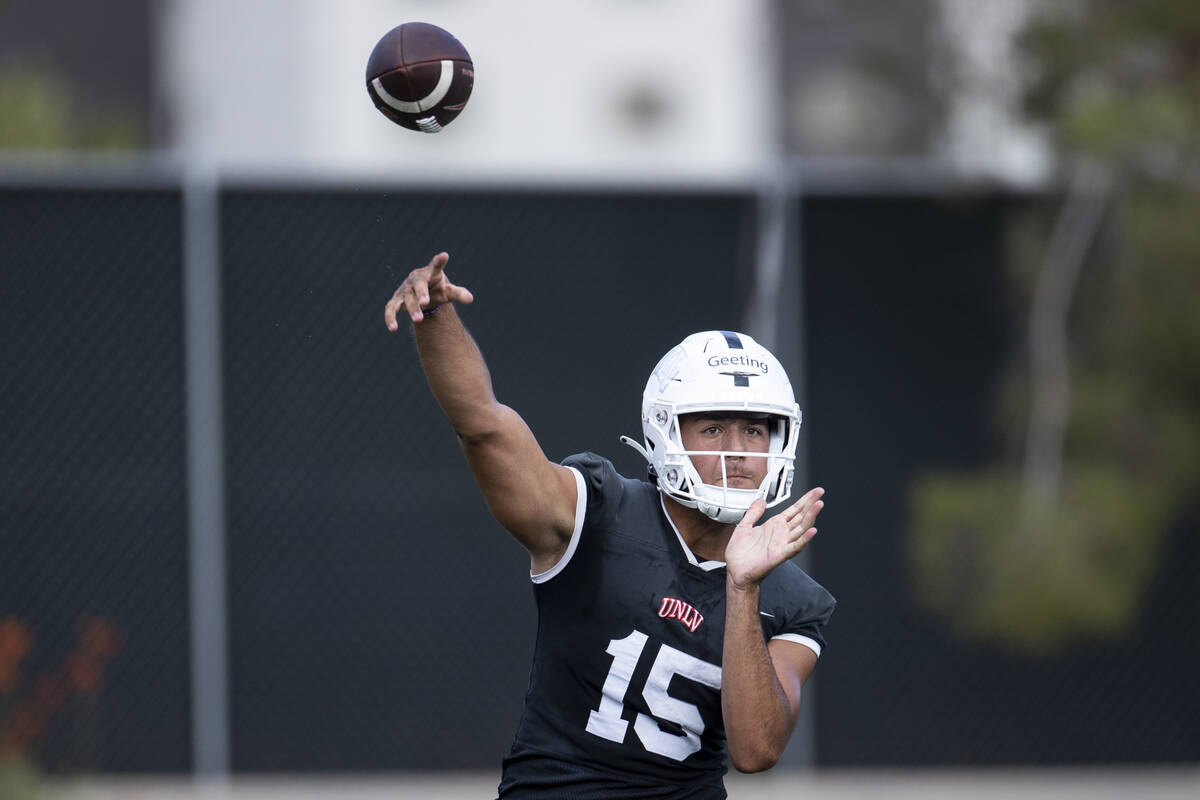 UNLV's Matthew Geeting (15) throws a pass during a team football practice at UNLV in Las Vegas, ...