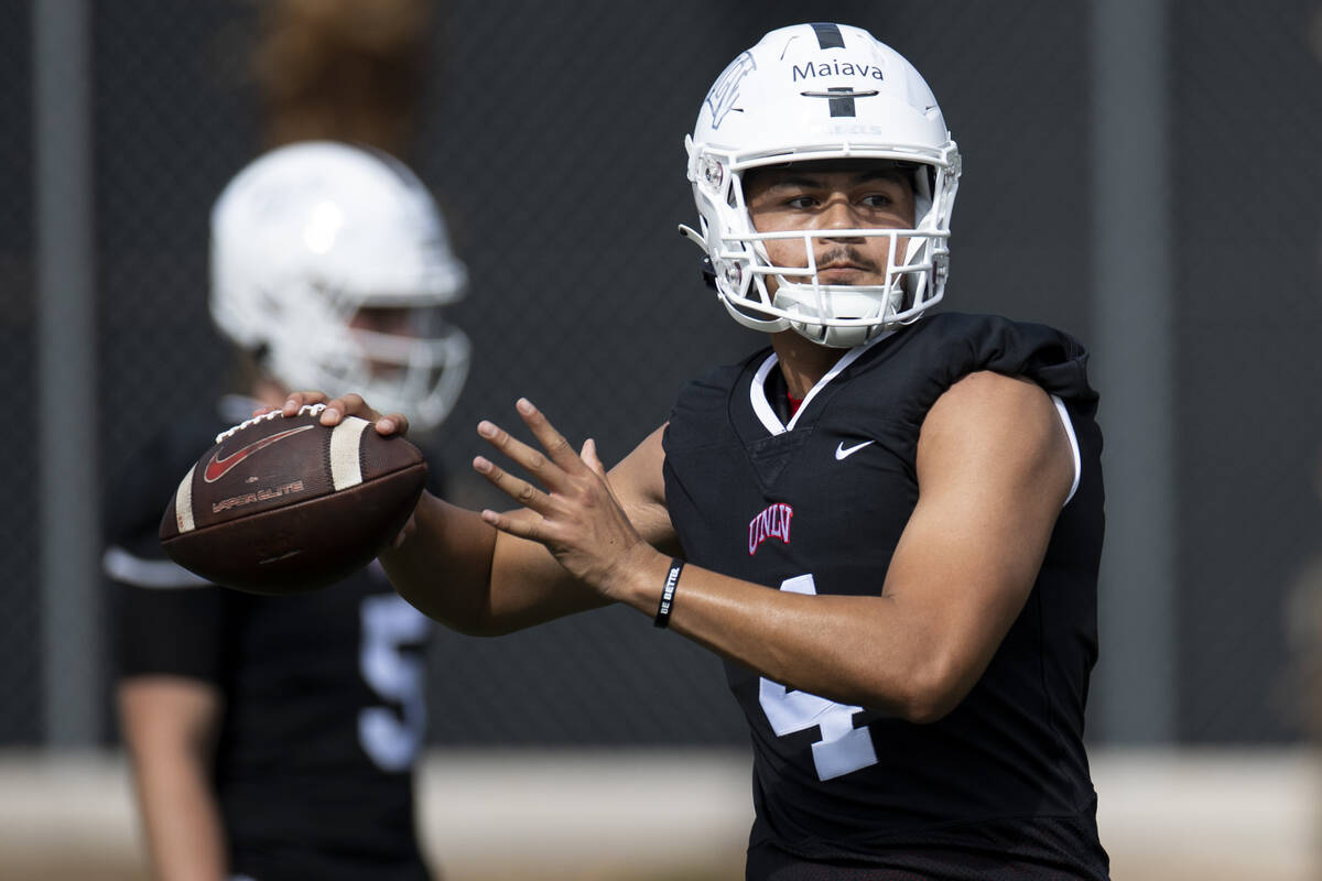 UNLV's Jayden Maiava (4) gets ready to throw a pass during a team football practice at UNLV in ...
