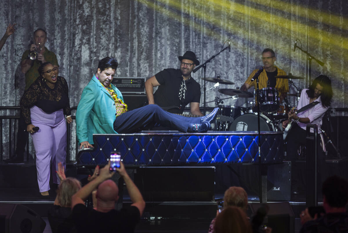 Frankie Moreno plays atop his piano during the opening night performance of his the first resid ...