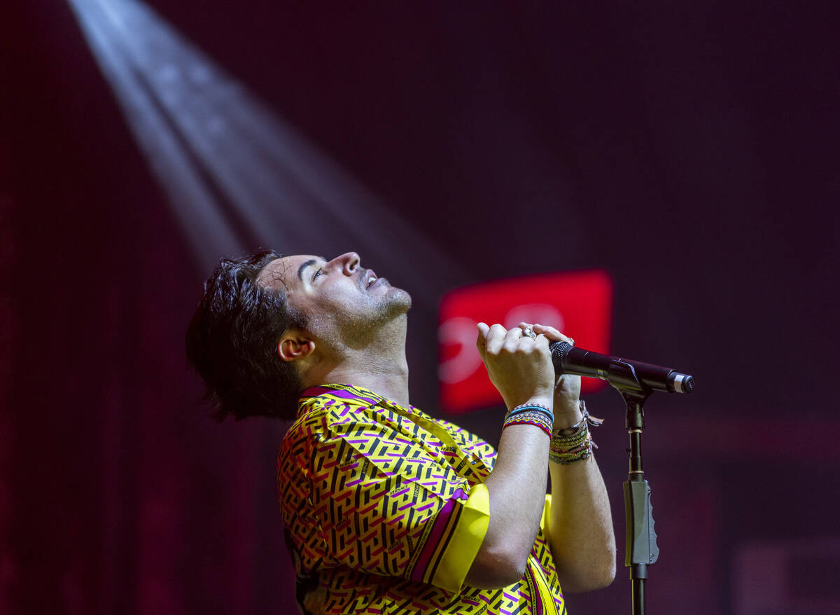 Frankie Moreno sings and plays the harmonica during the opening night performance of his the fi ...