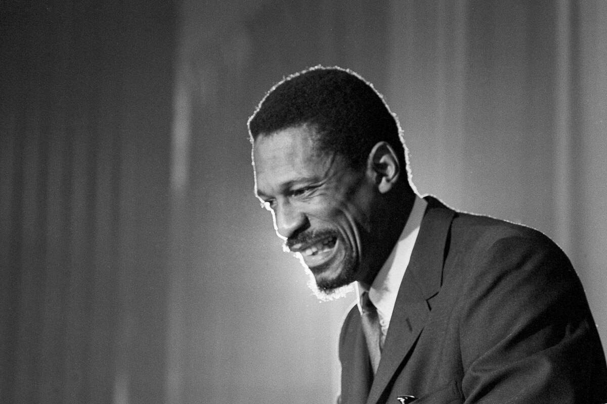 FILE - Bill Russell grins at announcement that he had been named coach of the Boston Celtics ba ...