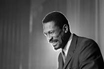 FILE - Bill Russell grins at announcement that he had been named coach of the Boston Celtics ba ...