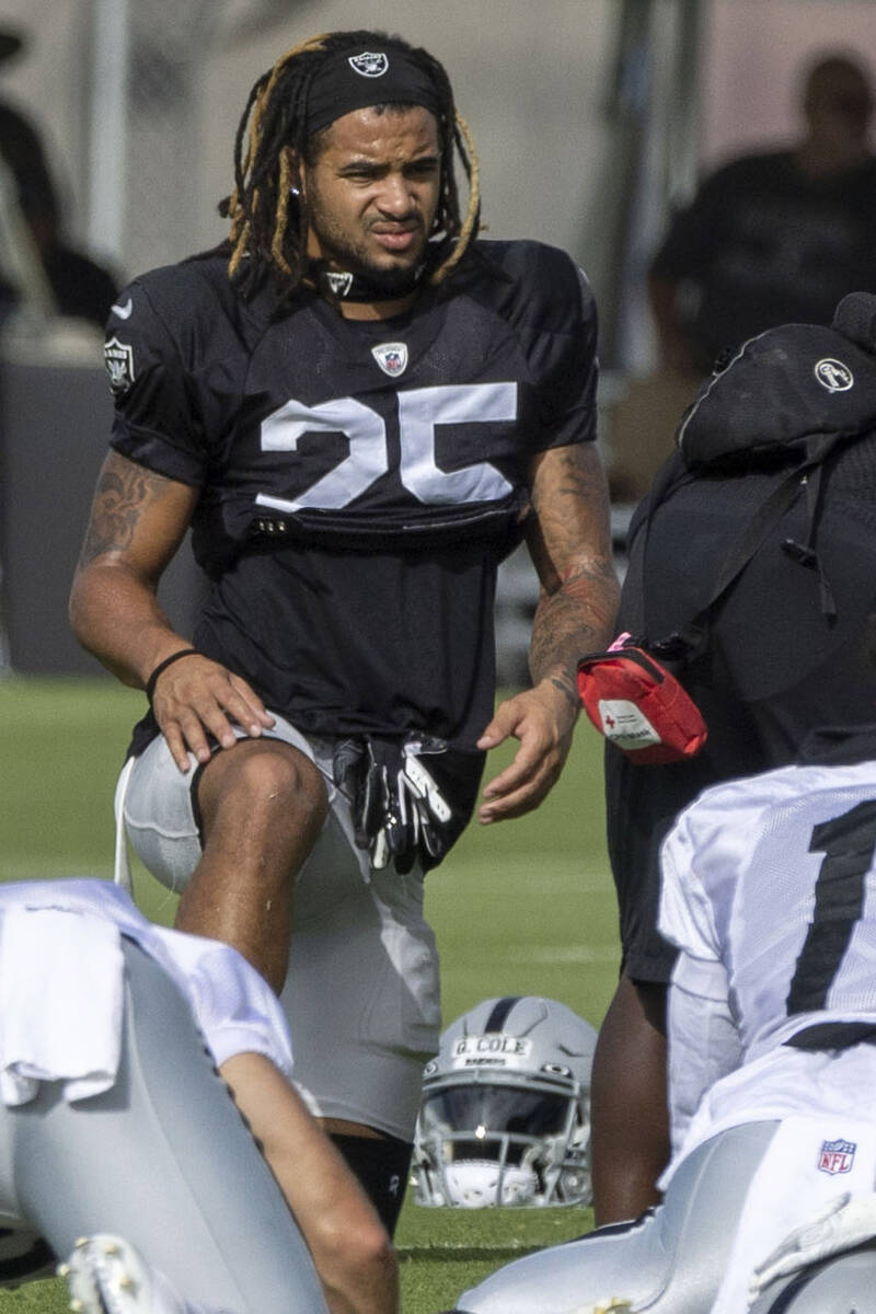 Raiders safety Tre'von Moehrig (25) stretches during the team’s training camp practice a ...