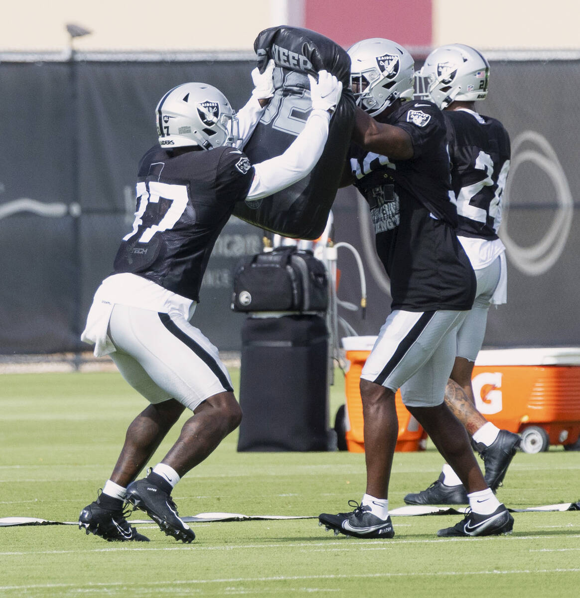 Raiders safety Tyree Gillespie (37) and safety Duron Harmon (30) drill together during the team ...