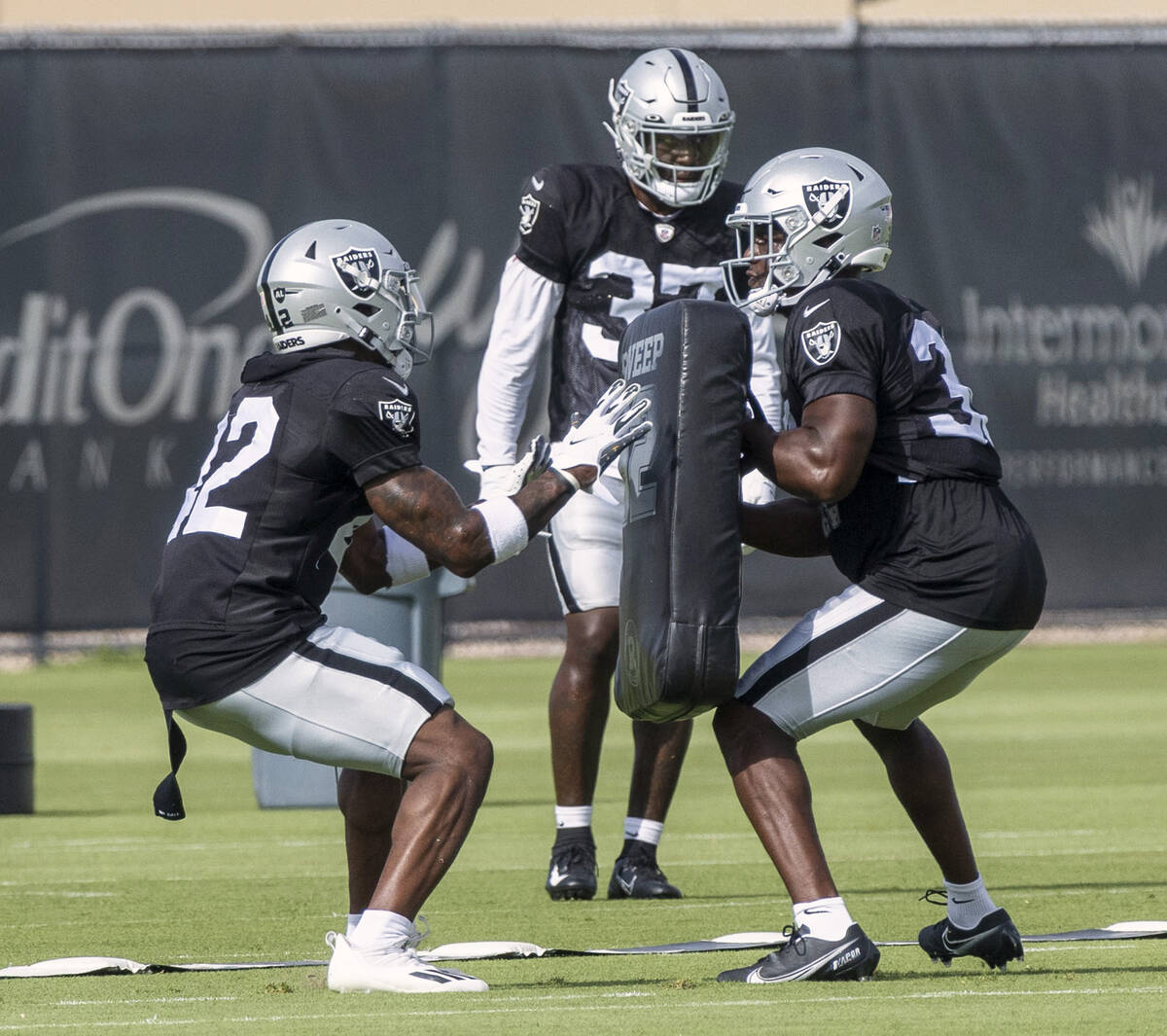 Raiders safeties Qwynnterrio Cole (42) and Duron Harmon (30) drill as Tyree Gillespie (37) look ...