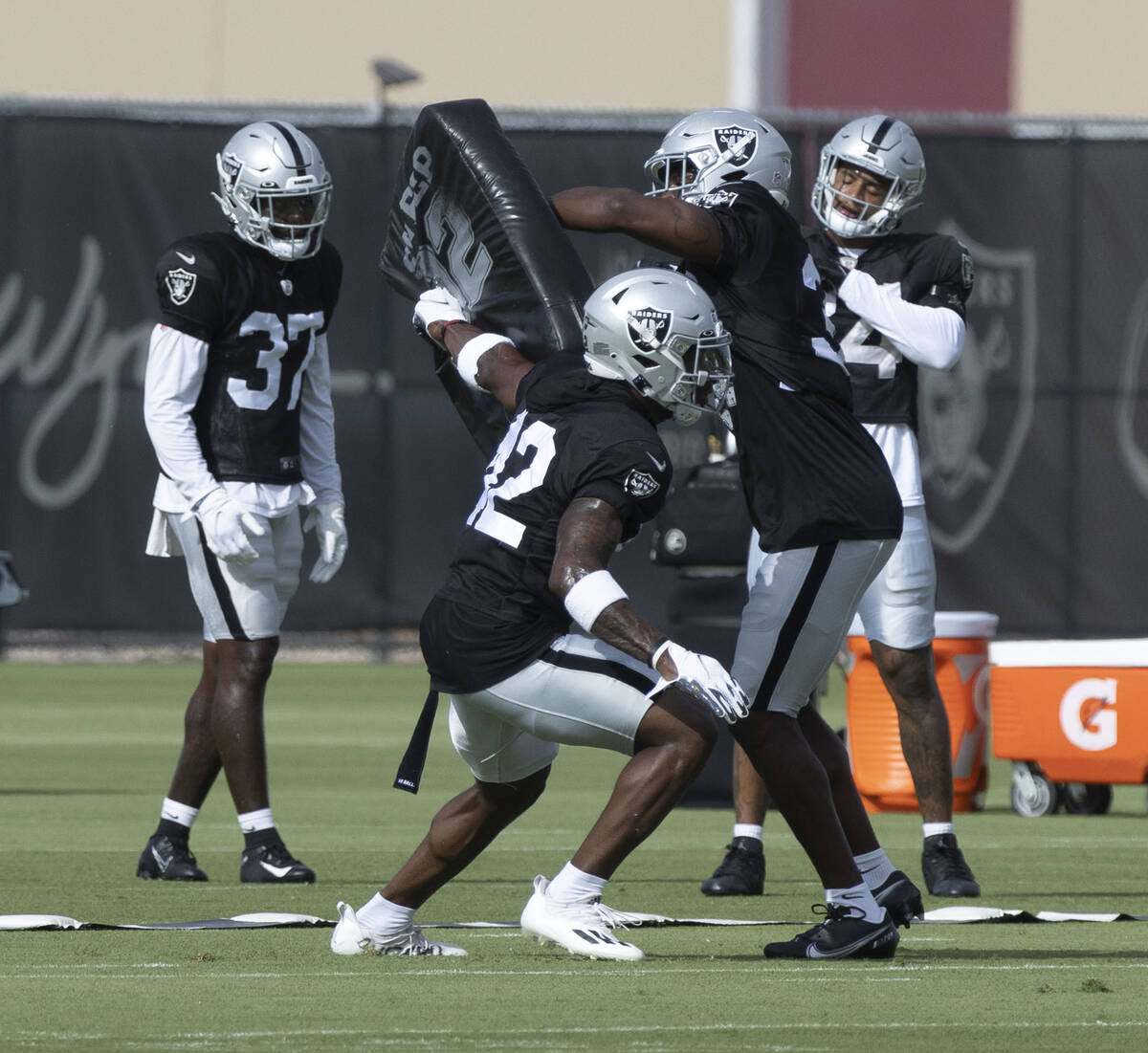 Raiders safeties, from left, Tyree Gillespie (37), Qwynnterrio Cole (42), Duron Harmon (30) and ...