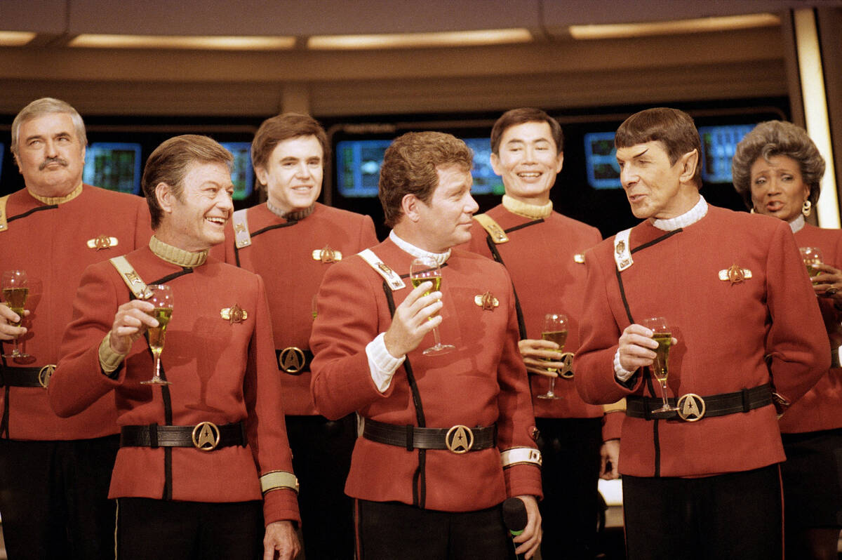 FILE - Members of the "Star Trek" crew, from left, James Doohan, DeForest Kelley, Wal ...