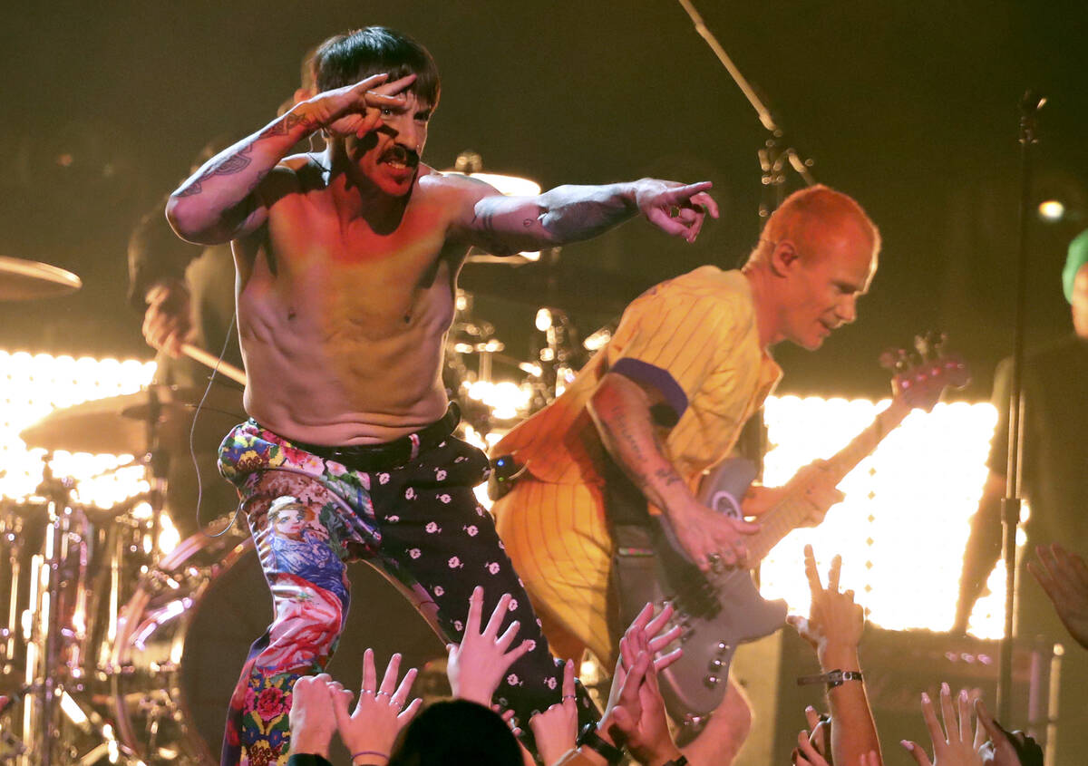 FILE - Anthony Kiedis, of Red Hot Chili Peppers, performs a medley at the 61st annual Grammy Aw ...
