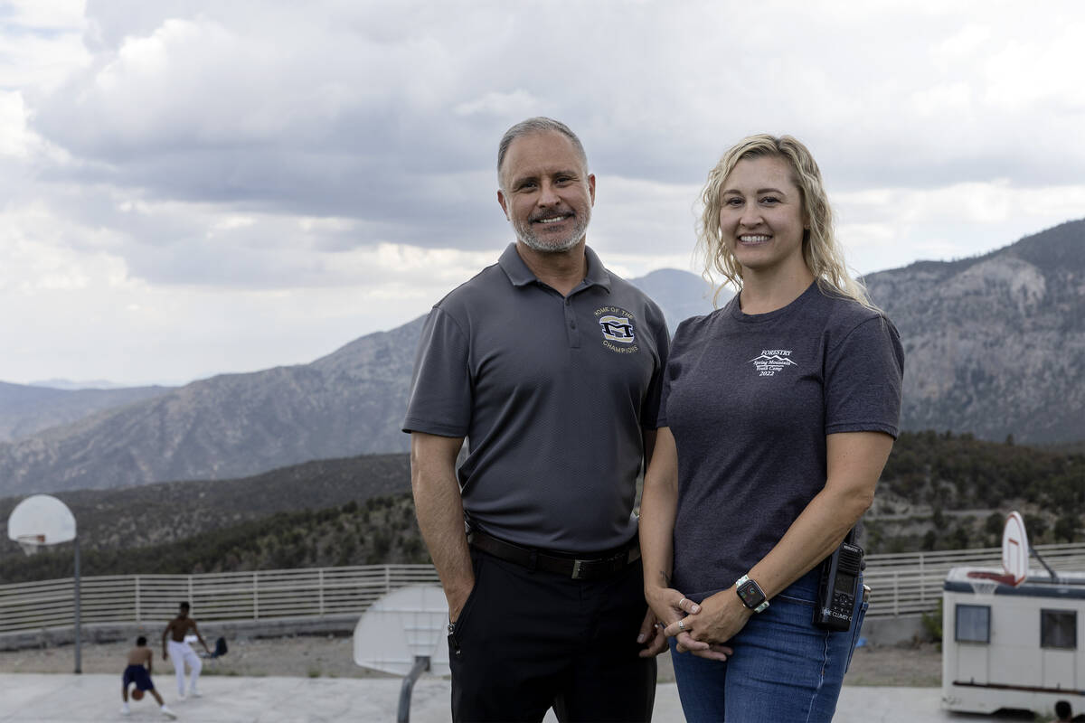 Cesar Lemos, Spring Mountain Youth Camp manager, left, and Kelly Storla, juvenile probation sup ...