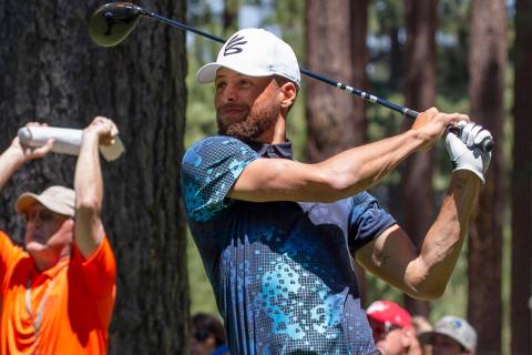 Stephen Curry watches his tee shot on the 14th hole during the final round of the American Cent ...