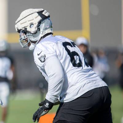 Raiders offensive guard Lester Cotton, Sr. (67) sets up for a drill during the team’s tr ...