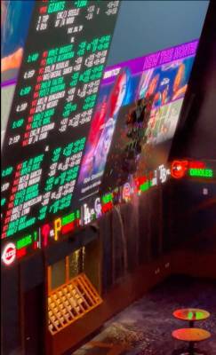 Water pours through the screen of the Circa sportsbook Thursday during a rainstorm. Screen shot ...