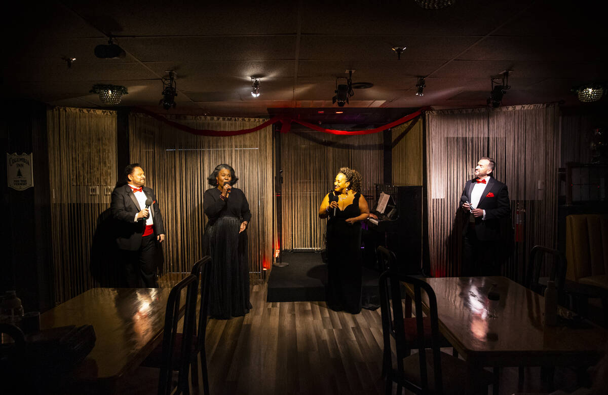 Singers, from left, Randal Keith, Amanda King, Michelle Johnson and Sam Holder perform during r ...