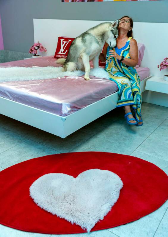 Kaden the Husky hangs out with Ioana Prunes in the Louis Vuitton boarding room at the Luxe Pet ...