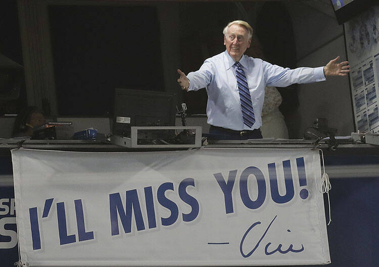 Vin Scully gestures in his booth Friday, Sept. 23, 2016, in Los Angeles. Scully's final game at ...