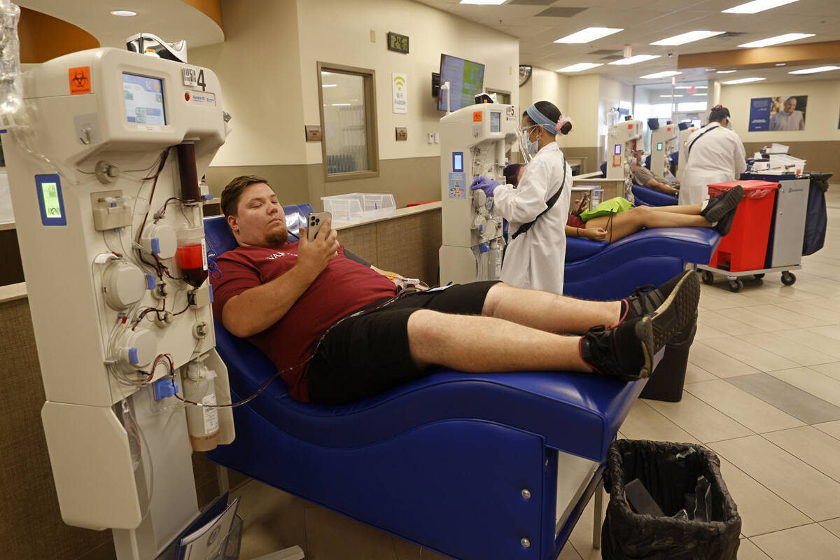 Mark Conoly of Las Vegas donates his plasma at the Grifols Biomat USA Plasma Center on Tropican ...