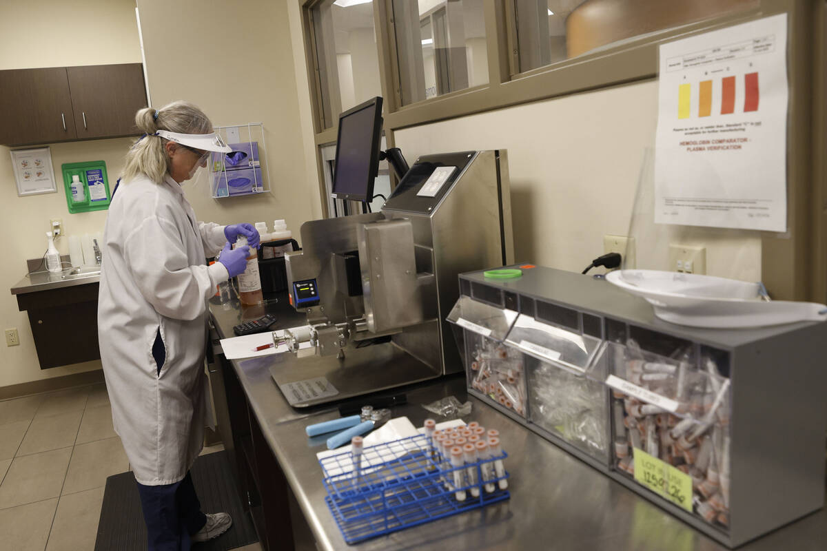 Plasma processor lead Pam Lindsey works at the Grifols Biomat USA Plasma Center on Tropicana Av ...