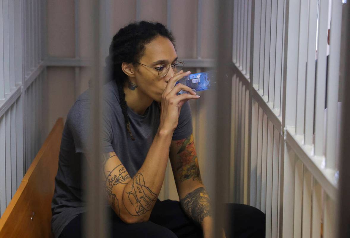 WNBA star and two-time Olympic gold medalist Brittney Griner drinks water as she listens a verd ...