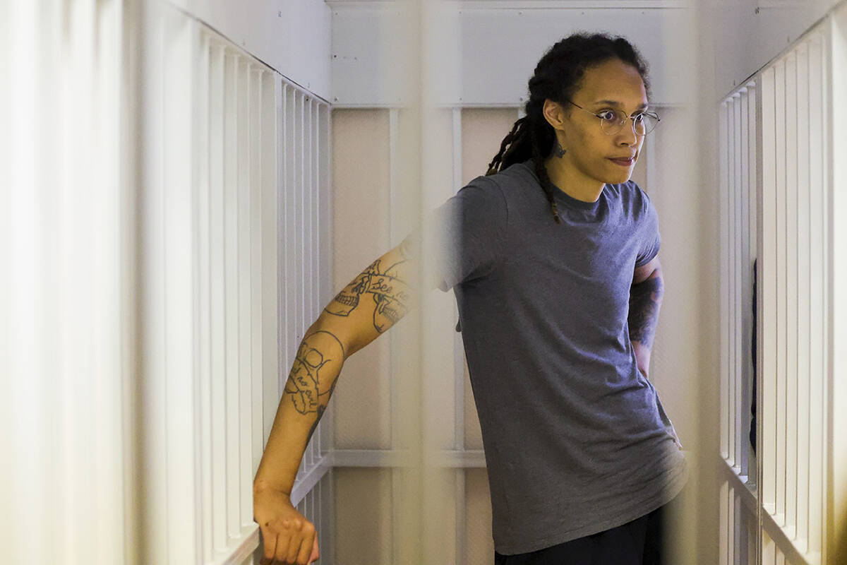 WNBA star and two-time Olympic gold medalist Brittney Griner, stands listening to a verdict in ...