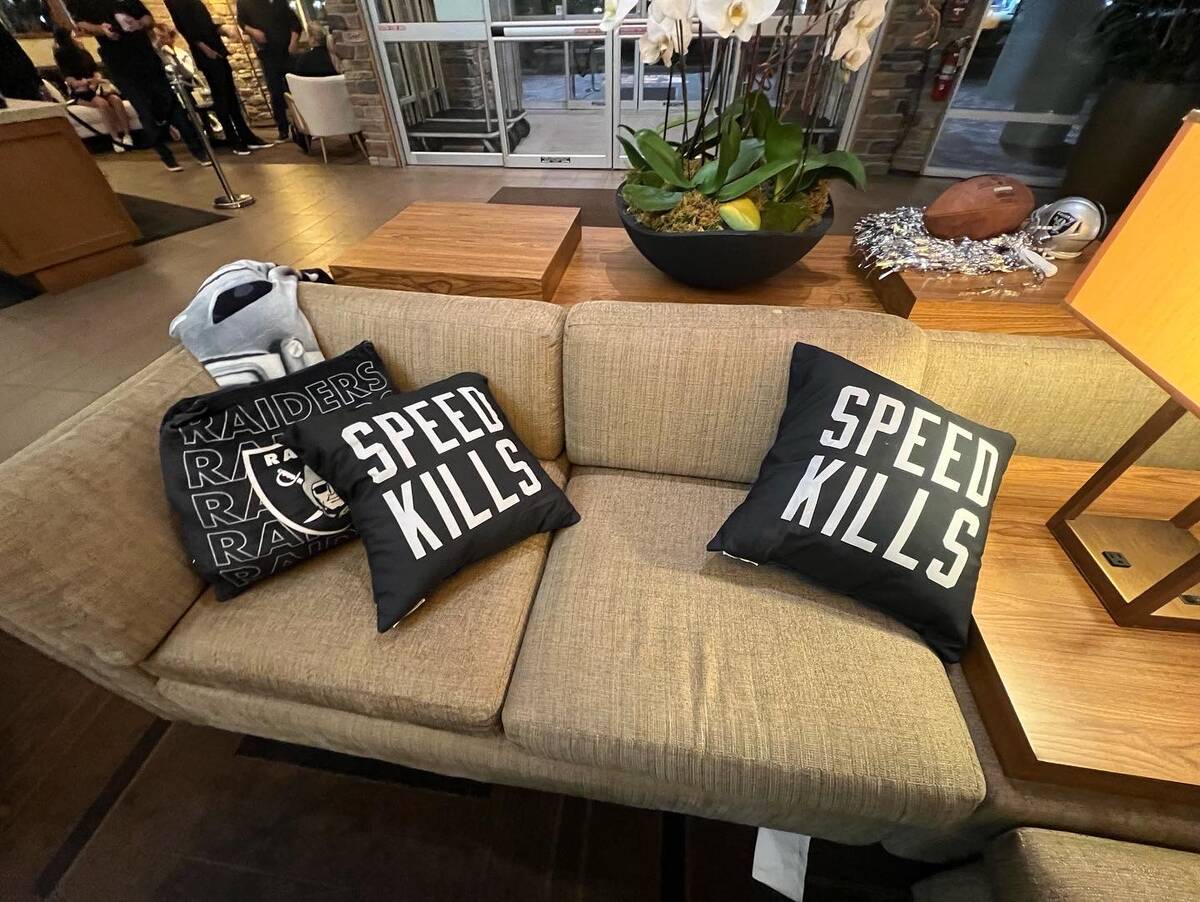 A shot of throw pillows paying tribute to Cliff Branch, at the Raiders' headquarters in Canton, ...