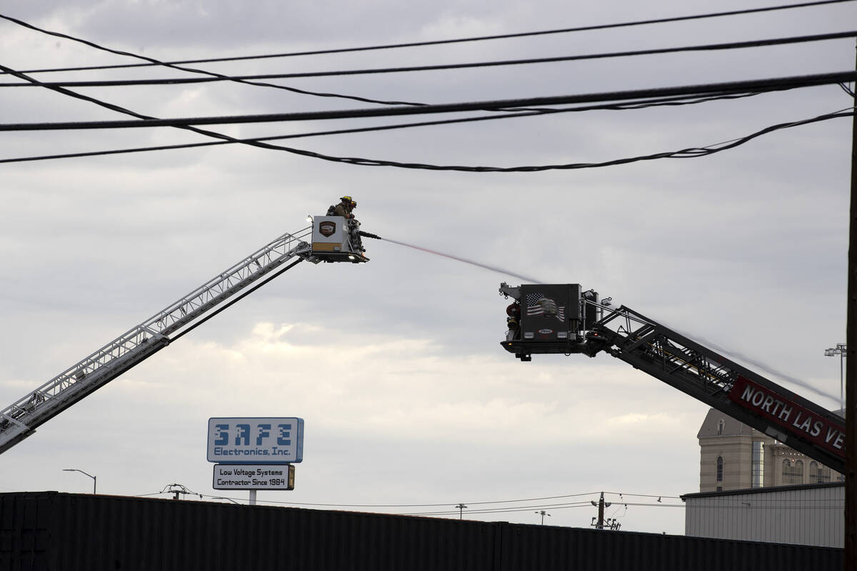 Las Vegas fire crews put out a fire at 2300 block of Industrial Road on Thursday, Aug. 4, 2022, ...
