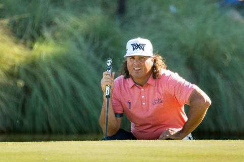 In this Oct. 5, 2019, file photo,Pat Perez eyes the cup as he lines up a putt on No. 18 during ...