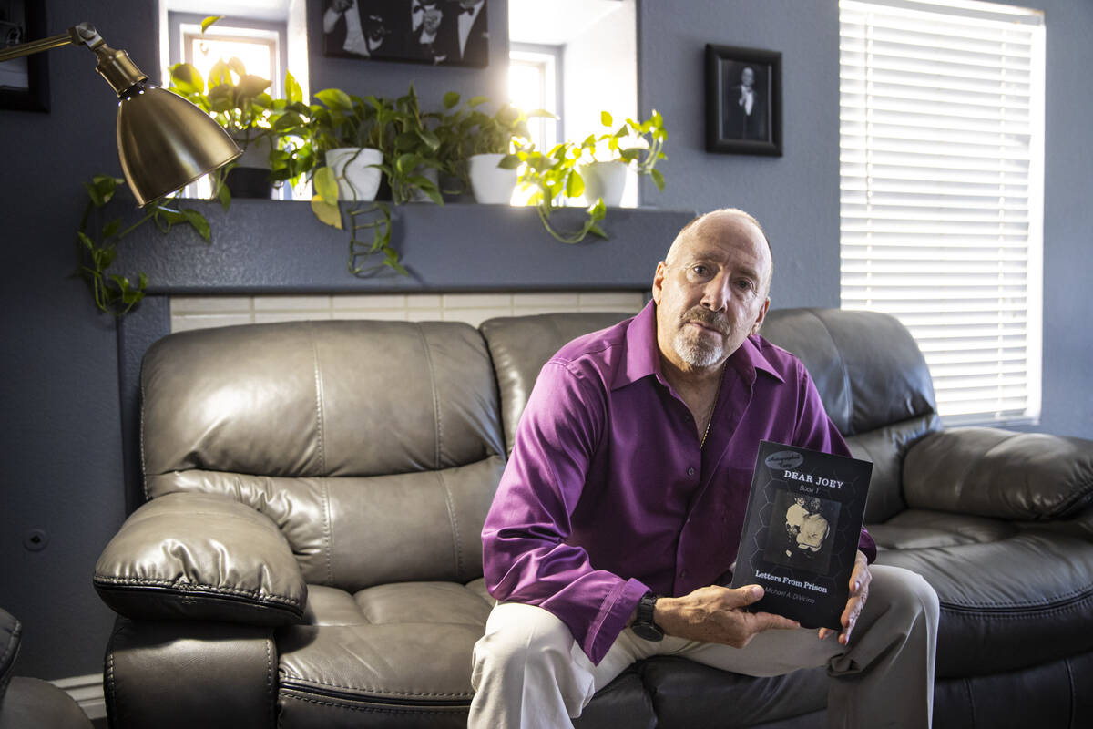 Michael DiVicino, former inmate and author, poses for a portrait with his book “Dear Joey: Le ...