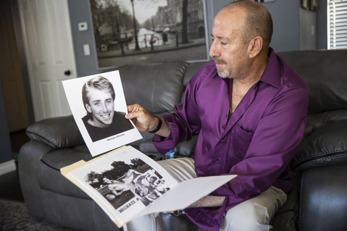 Michael DiVicino, former inmate and author, shows a photo of himself on July 27, 2022, in Las V ...
