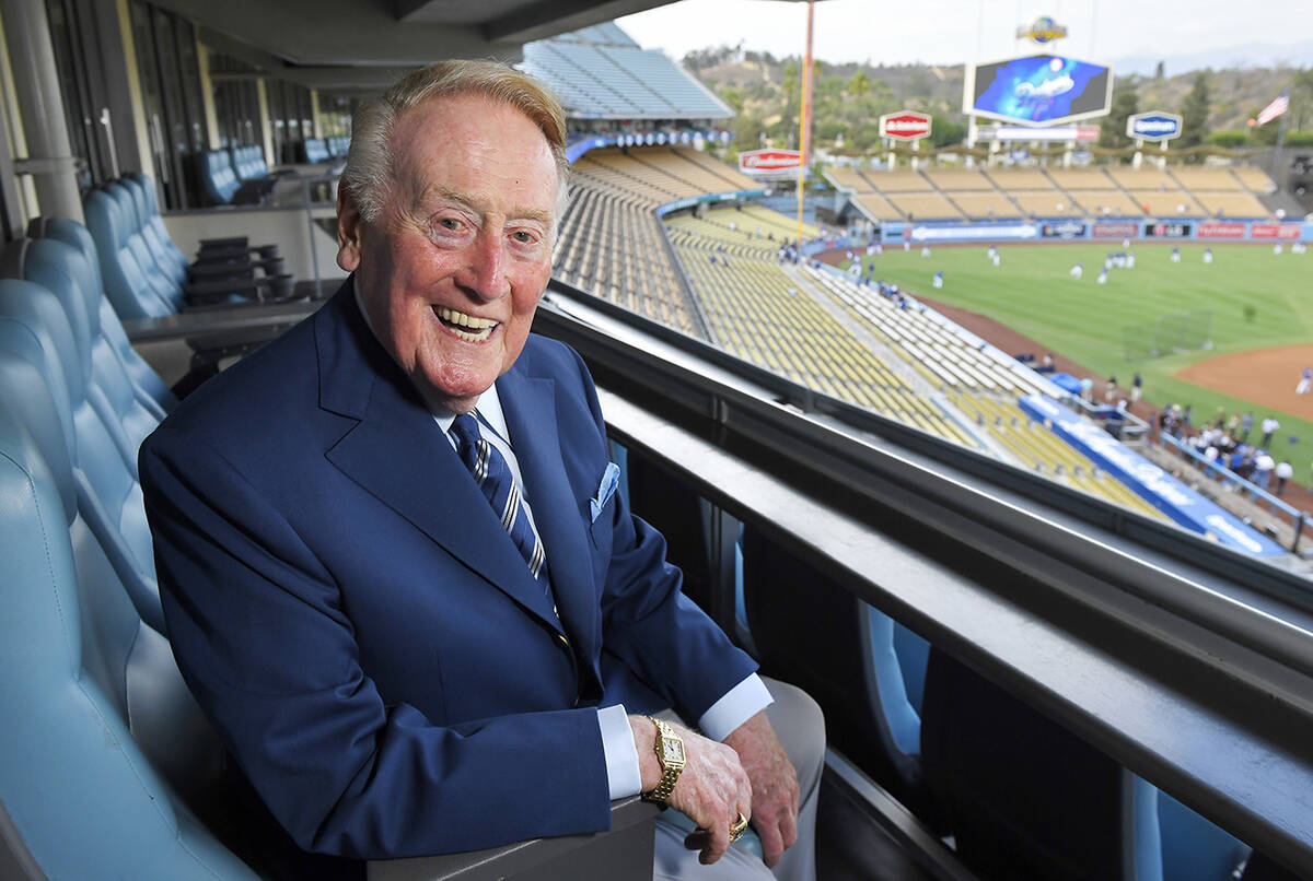 Vin Scully poses for a photo prior a baseball game between the Los Angeles Dodgers and the San ...