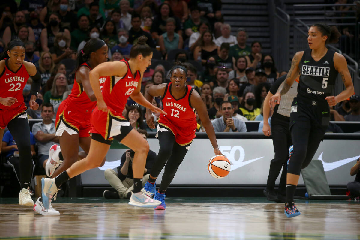 Chelsea Gray #12 of the Las Vegas Aces dribbles the ball during the game against the Seattle St ...