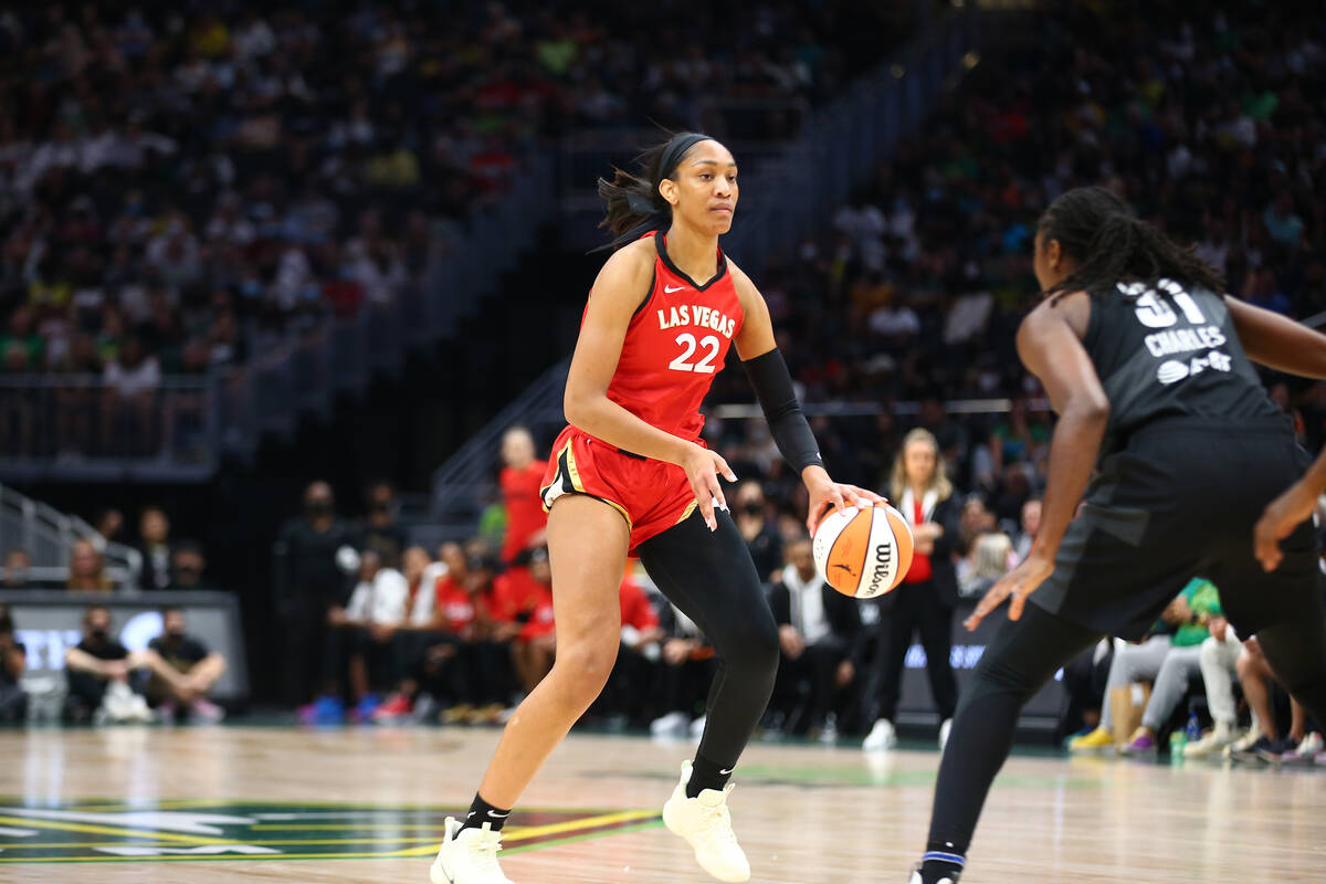 A'ja Wilson #22 of the Las Vegas Aces dribbles the ball during the game against the Seattle Sto ...