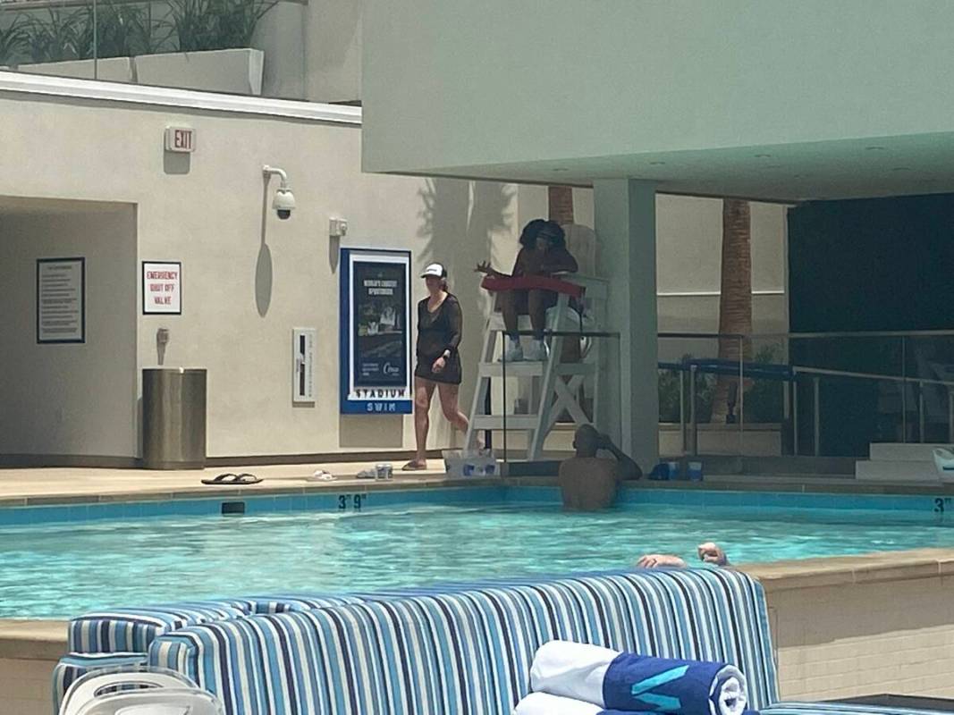 A lifeguard sits at a shaded station at Circa Resort's Stadium Swim on July 22, 2022. There wer ...