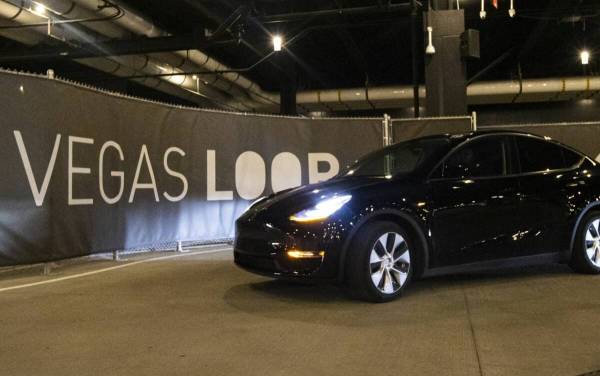 A Vegas Loop Tesla departs from the Boring tunnel passenger station at Resorts World Las Vegas ...