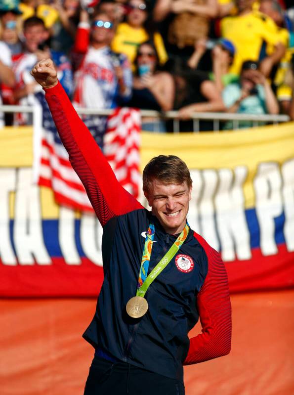 Gold medalist Connor Fields of the United States celebrates during a victory ceremony for the m ...