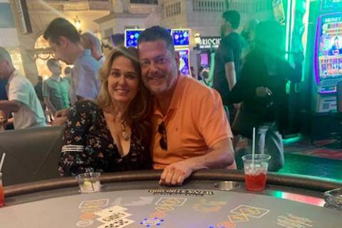 Miguel Tornel, right, and his wife, celebrates his Mega Jackpot of $245,678 on Three Card Poker ...