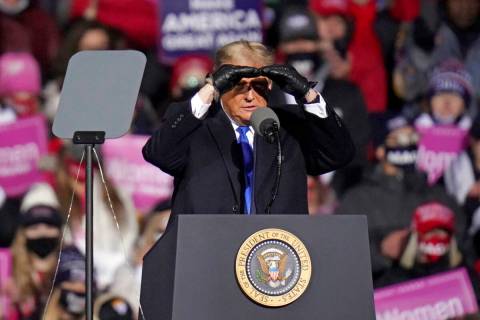 President Donald Trump speaks at a campaign rally in Omaha, Neb., Tuesday, Oct. 27, 2020. (AP P ...