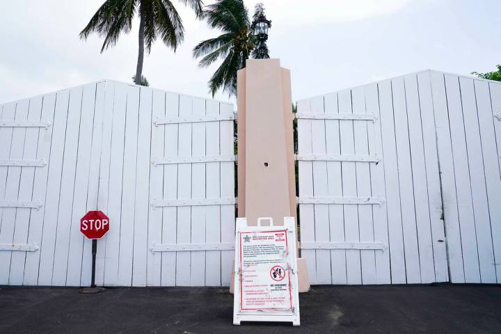 A gate is closed at the entrance to former President Donald Trump's Mar-a-Lago estate, Tuesday, ...