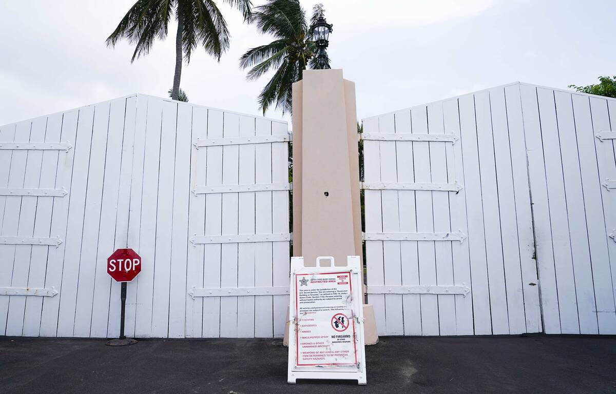 A gate is closed at the entrance to former President Donald Trump's Mar-a-Lago estate, Tuesday, ...
